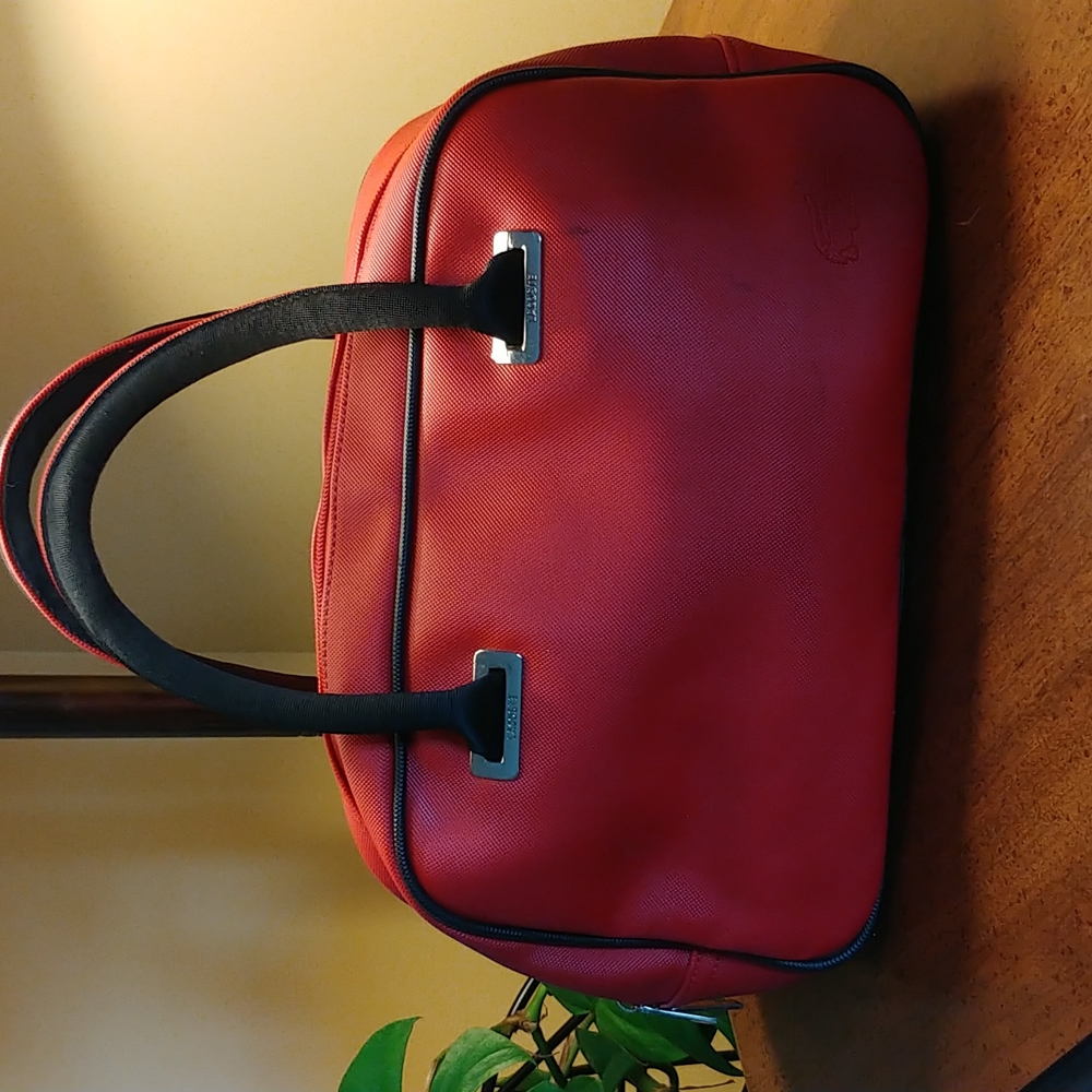 Red Lacoste mini bowler bag